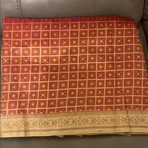 Indian red and golden sari fabric